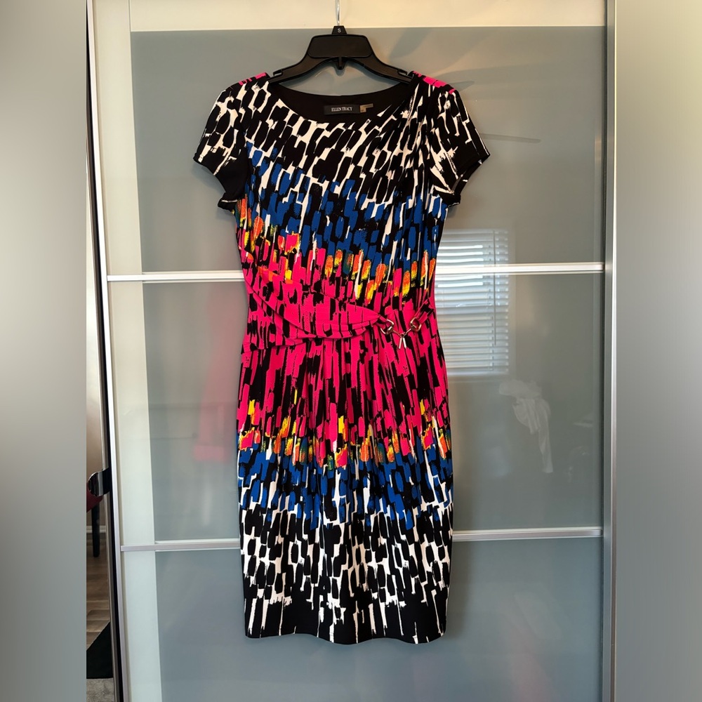 Women’s dress. Gold details.